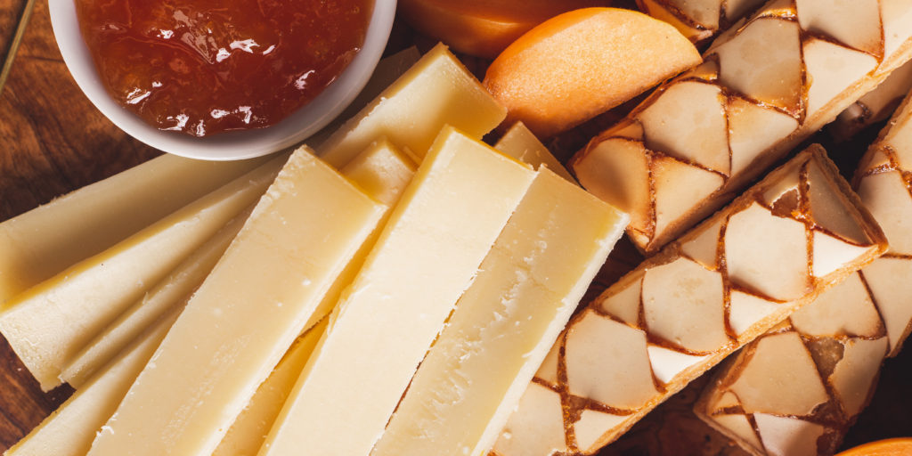 Gruyere cheese board with apricots and walnuts Emmi Roth